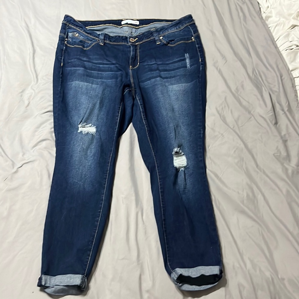 Dark washed ripped jeans
